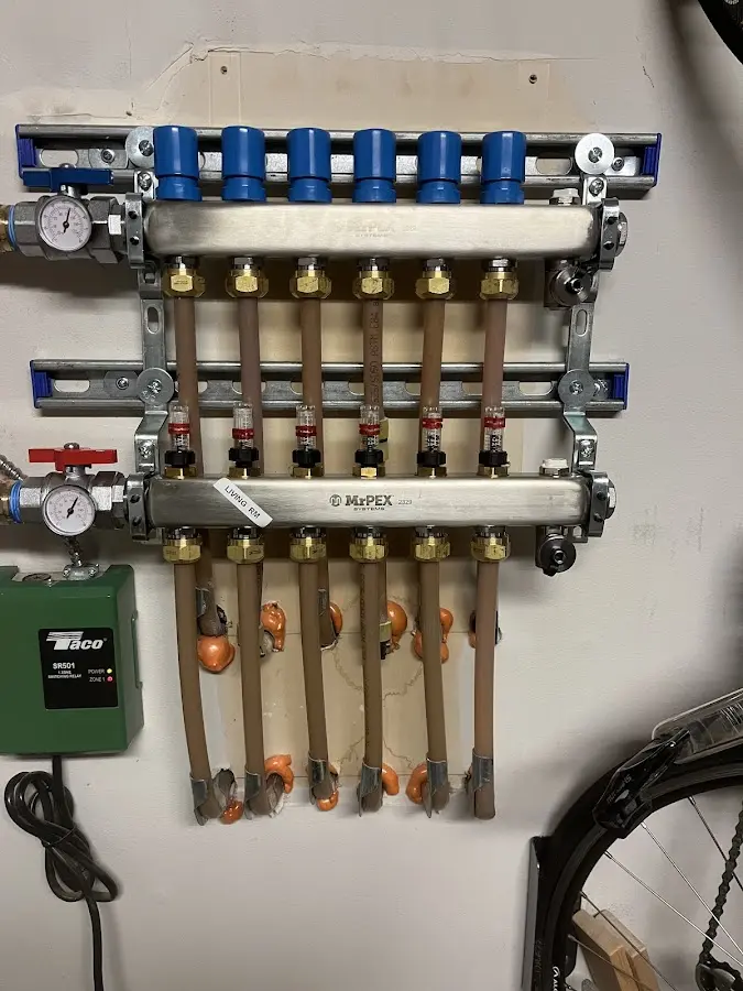 Plumber performing Gas Line Installation at a residential property in Laurel Hill