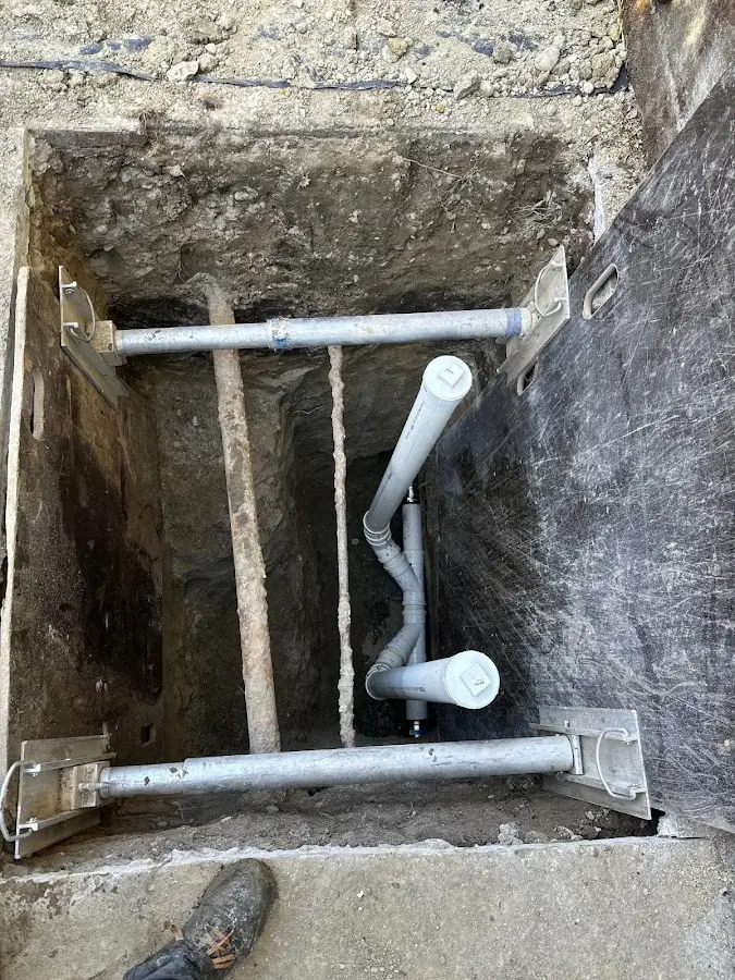 Experienced plumber completing Drain Cleaning work in Laurel Hill